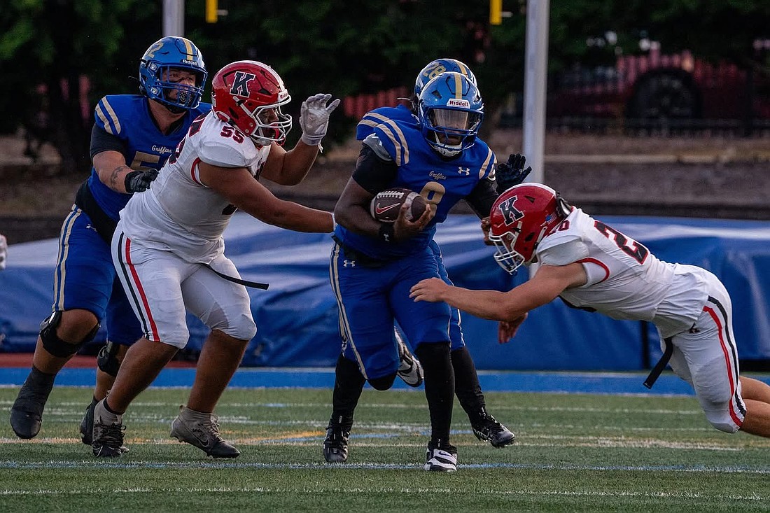 Senior Khaden Davis dominates in Donovan Catholic’s first home football game of the season Aug. 31 against Kingsway, Woolwich Township. Facebook photo