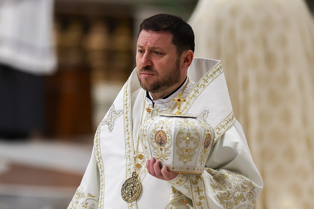 Cardinal Mykola Bychok of the Ukrainian Catholic Eparchy of Sts. Peter and Paul in Melbourne, Australia, processes into St. Peter's Basilica to celebrate Mass with Pope Francis at the Vatican Dec. 8, 2024, the feast of the Immaculate Conception. (CNS photo/Lola Gomez)