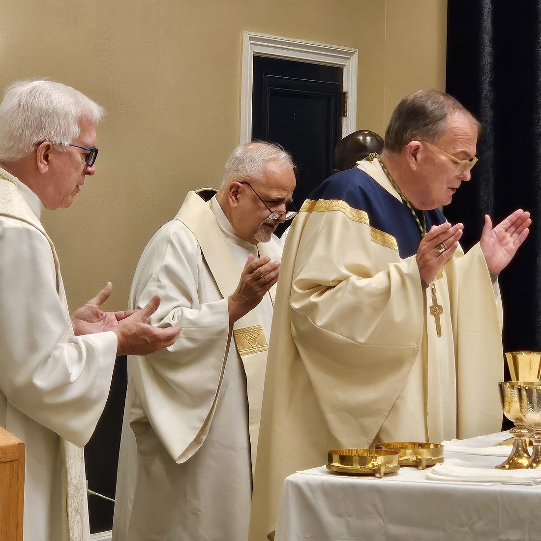 During the Sept. 17 Mass, Bishop O'Connell is joined at the altar by Redemptorist Father Kevin O'Neil, left, who is the keynote speaker at this year's Priests Convocation, and Msgr. Sam Sirianni, rector of St. Robert Bellarmine Co-Cathedral, Freehold. Mary Stadnyk photos
