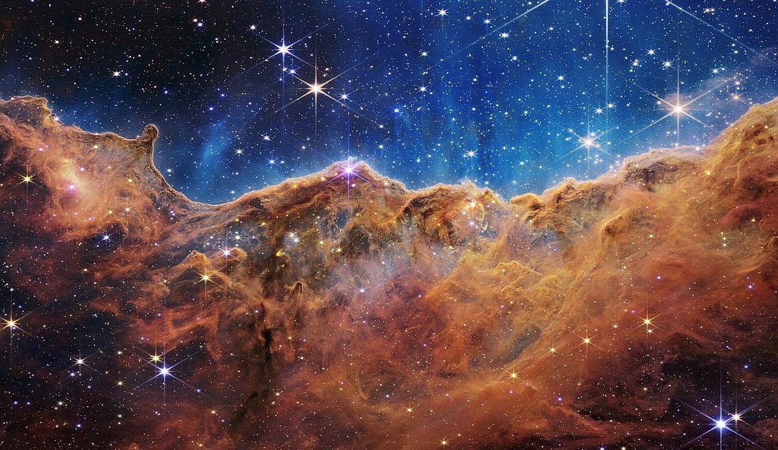 The "Cosmic Cliffs" of the Carina Nebula are seen in an image released by NASA July 12, 2022. The image is from data provided by NASA's James Webb Space Telescope, a revolutionary apparatus designed to peer through the cosmos to the dawn of the universe. (OSV News photo/NASA, ESA, CSA, STScI, Webb ERO Production Team, Handout via Reuters)