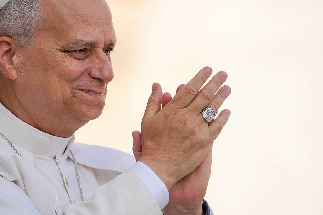 Pope Leo XIV greets visitors and pilgrims from the popemobile as he rides around St. Peter's Square at the Vatican before his weekly general audience Sept. 17, 2025. (CNS photo/Lola Gomez)