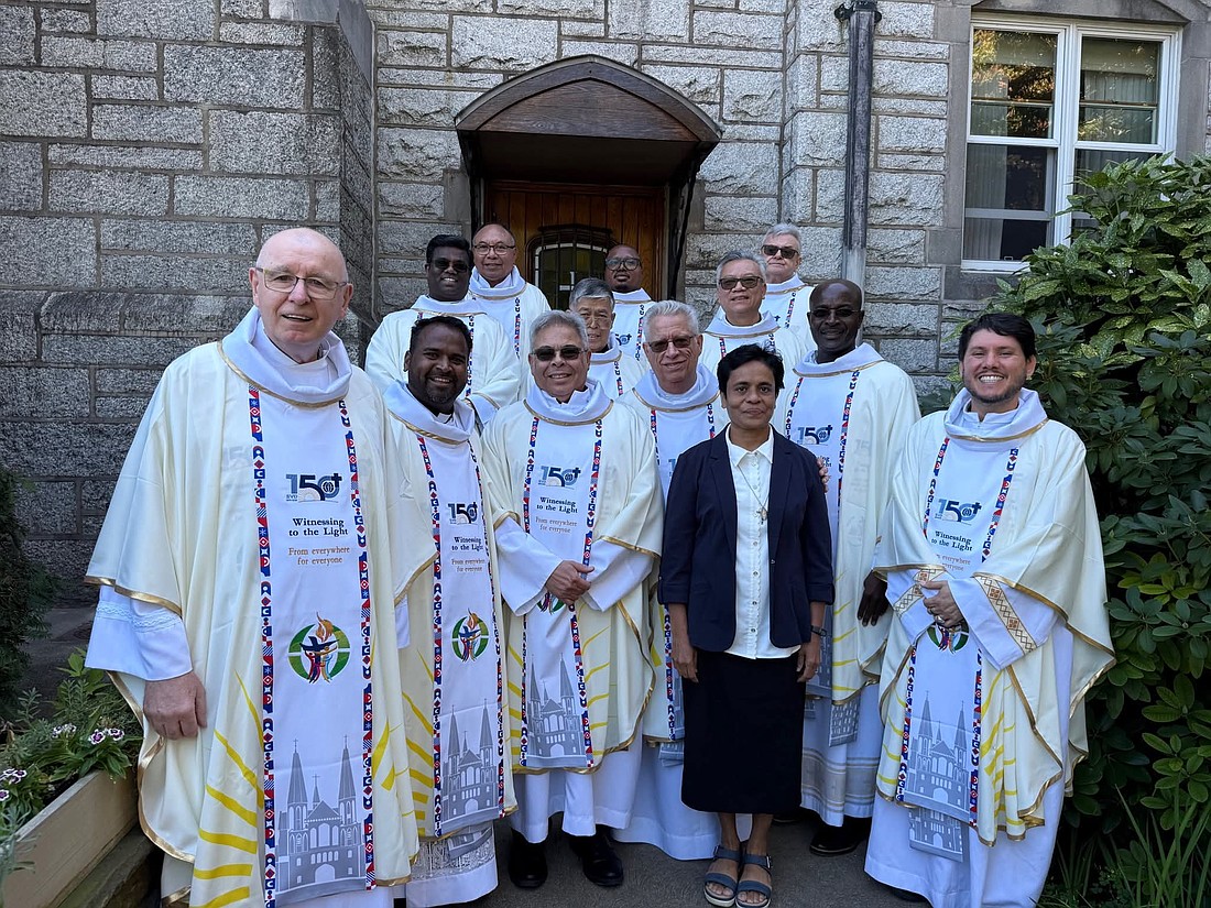 Gathered outside the Chapel of Divine Love following the SVD 150th anniversary Mass Sept. 8 are, from left, front row: Divine Word Fathers Jordan, Francis, Miguel, Bou, Sister Ancy, George and Andrino; from left, back row: Divine Word Fathers Stephen, Andrew, Jun, Fluery, Paul and Phelaen. Courtesy photo