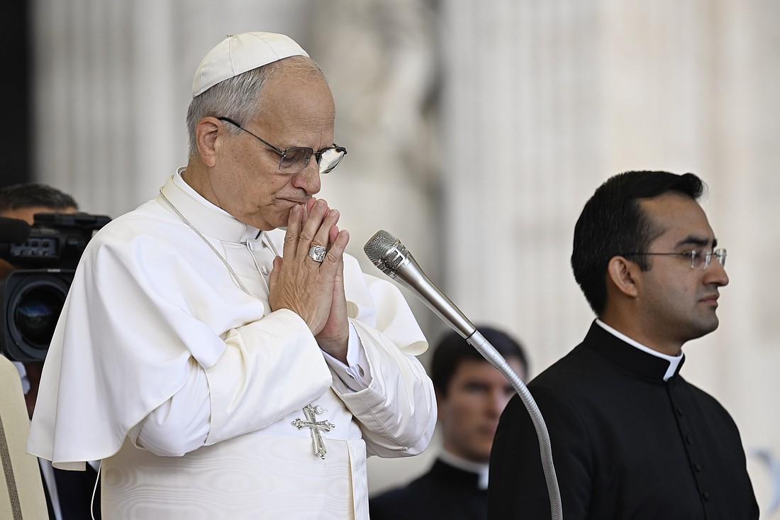 Pope Leo XIV prays during his weekly general audience in St. Peter's Square at the Vatican Sept. 24, 2025. (CNS photo/Vatican Media)