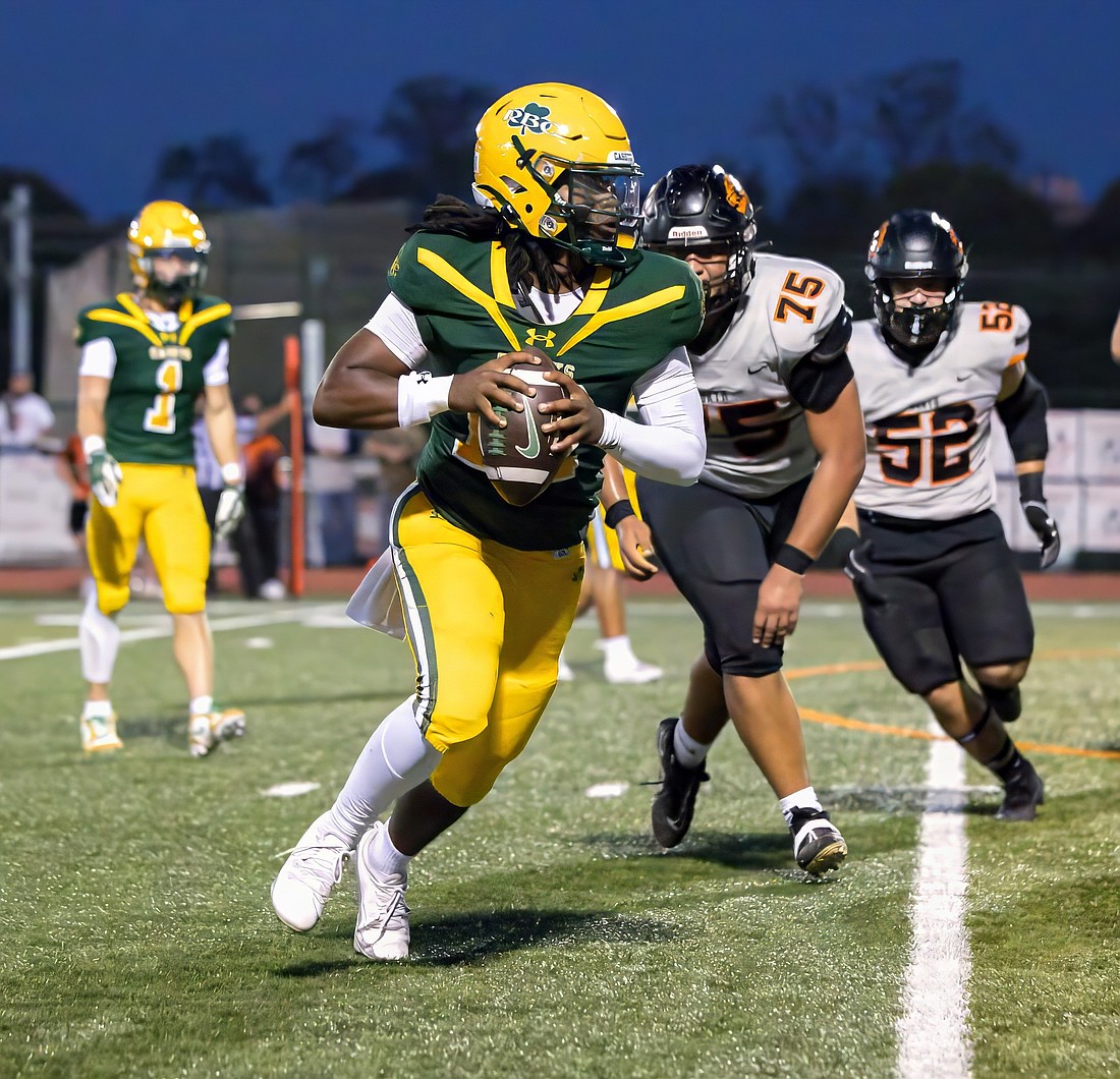 In just his first year behind center, Red Bank Catholic quarterback Rahmir Rivera has been as good as predicted through the Caseys first four games, as the freshman has completed 76 percent of his passes for 712 yards and eight touchdowns. Photo courtesy of Jennifer Harms/jharmsphotography.com