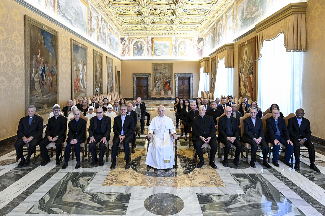 Pope Leo XIV poses for a photo with the writers and staff of Civiltà Cattolica, a Jesuit magazine, at the Vatican Sept. 25, 2025. To the right of the pope is Father Arturo Sosa, superior general of the Jesuits. (CNS photo/Vatican Media)