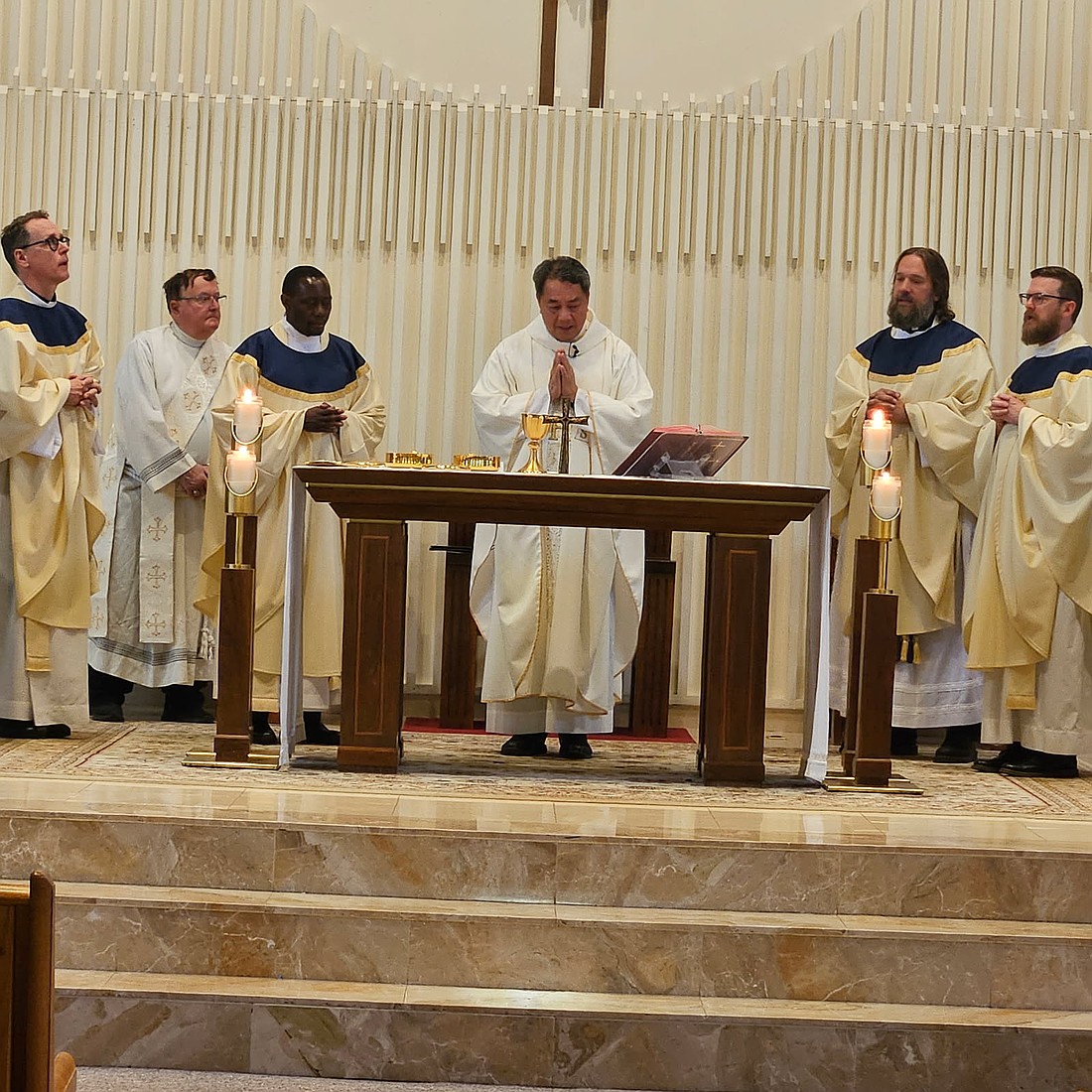 Father Peter James Alindogan, pastor of St. Veronica Parish, Howell, center, served as principal celebrant of the Mass for the Sept. 27 Convocation of Parish Pastoral Council members in St. Catharine Church, Holmdel. Concelebrating priests were, from left, Father Joel Wilson, pastor, Our Lady of Perpetual Help, Maple Shade; Father Evarist Kabagambe, pastor, St. Elizabeth Ann Seton, Whiting; Father Dave Swantek, pastor of St. Martha, Point Pleasant, and Father Patrick McPartland, pastor of St. Catharine Parish, Holmdel. Second from left is Deacon Thomas DiCanio who assisted. Mary Stadnyk photo