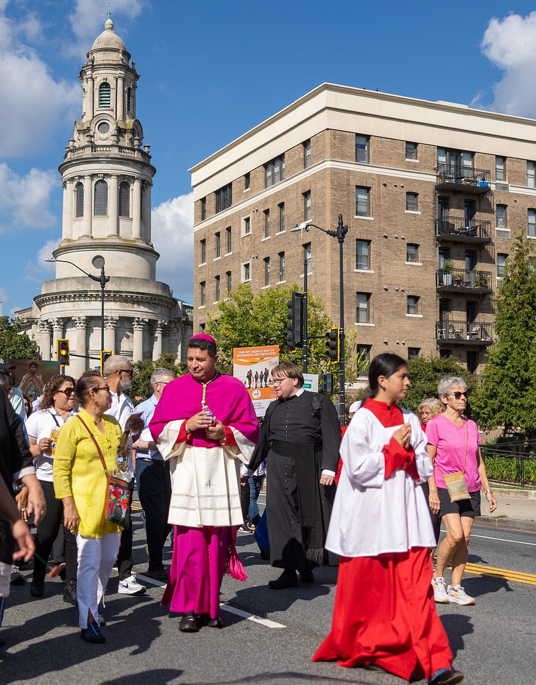Washington Auxiliary Bishop Evelio Menjivar, at center, helps lead a procession in Washington on Sept. 28, 2025, to mark the 111th World Day of Migrants and Refugees. The procession began at the Shrine of the Sacred Heart and concluded at the Cathedral of St. Matthew the Apostle, where Cardinal Robert W. McElroy celebrated a Mass marking that day. (OSV News photo/Catholic Standard, Mihoko Owada)