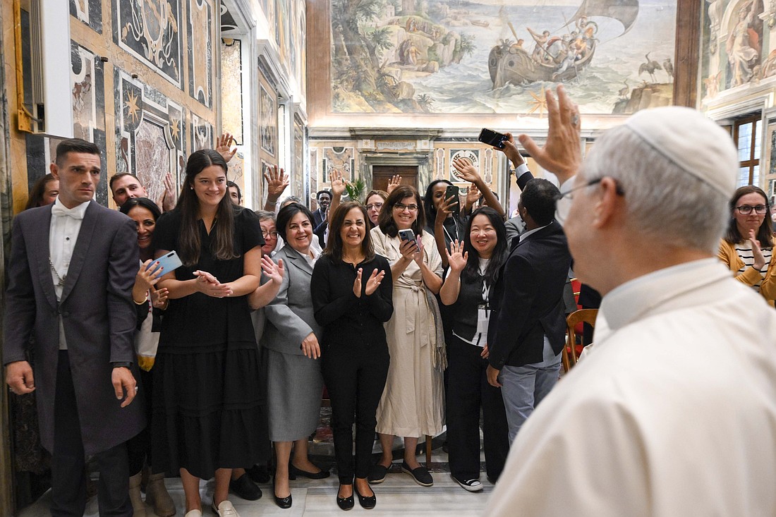Pope Leo XIV waves goodbye to participants in the conference "Refugees & Migrants in Our Common Home," organized by the Augustinian-run Villanova University in suburban Philadelphia, at the end of an audience at the Vatican Oct. 2, 2025. (CNS photo/Vatican Media)