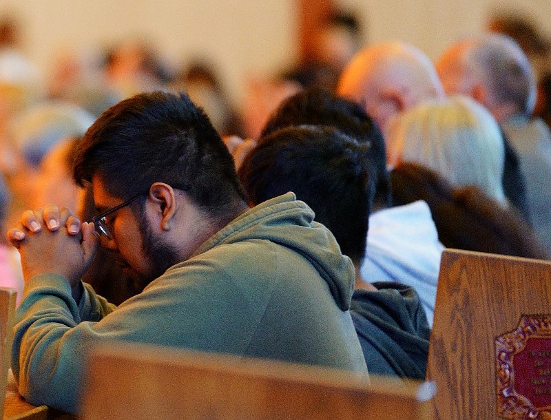 A pilgrim intently prays during the diocesan pilgrimage to the Shrine of Our Lady of Czestochowa in Doylestown, Pa., on Sept. 13. Father Garry Koch reflects on how prayer enhances a person's faith life. Jose Santiago photo