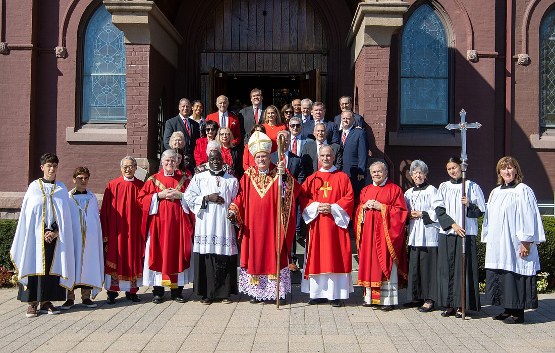 After Mass, the attorneys, judges, civic officials and students in attendance, gather for a group photo with Bishop O'Connell. Mary Iuvone photo