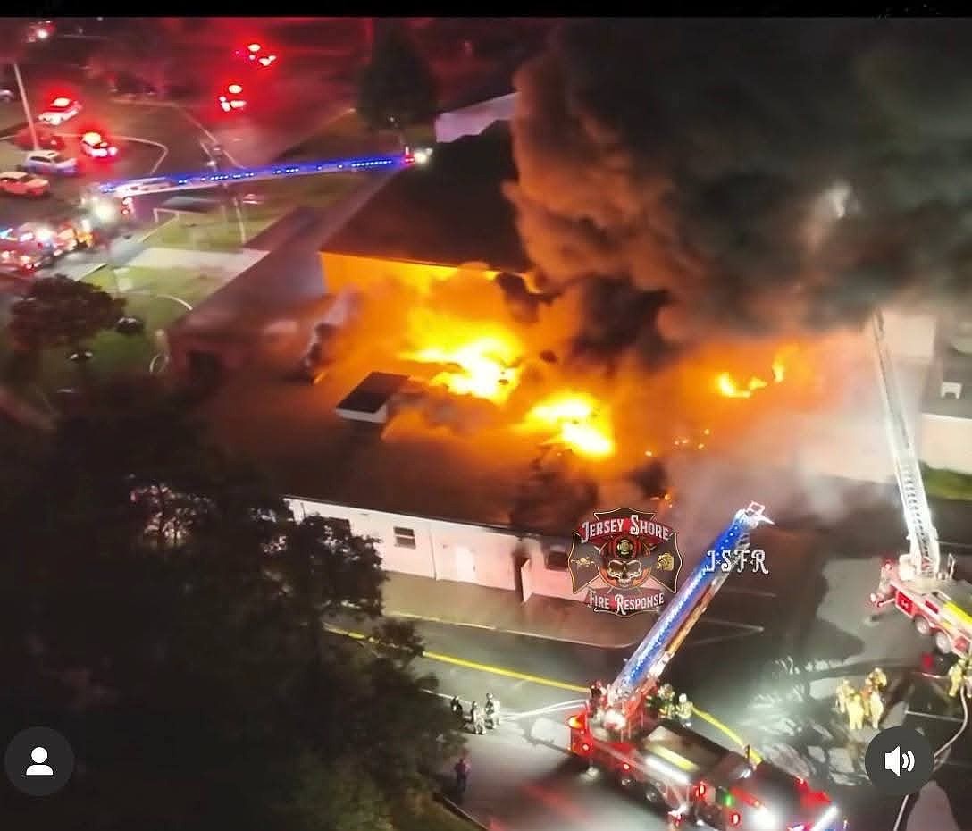 Firefighters battle the Oct. 3 blaze. Courtesy photo