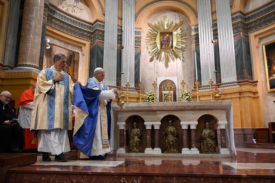 Pope Leo XIV incenses the altar during vespers at the Domus Australia in Rome Oct. 6, 2025, on the eve of the feast of Our Lady of the Rosary of Pompeii. (CNS photo/Vatican Media)