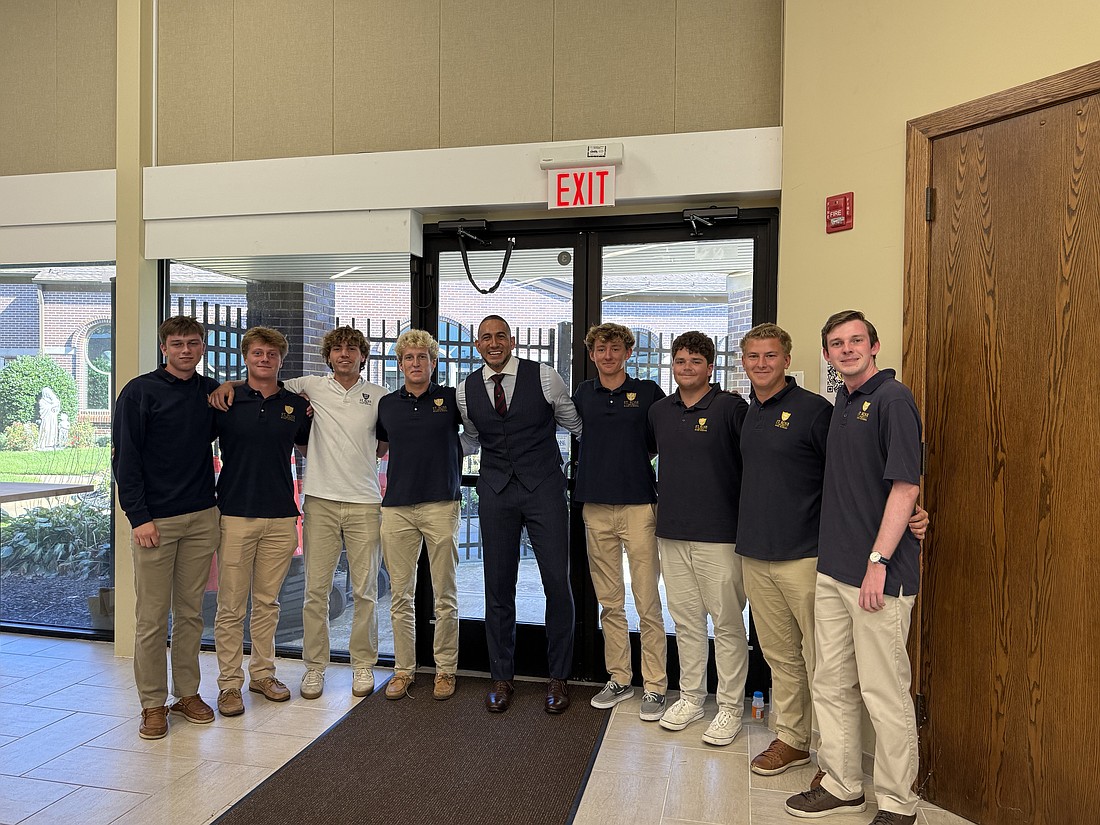 Keynote speaker Gian Paul Gonzalez joins student-athletes from St. Rose High School, Belmar, during the annual Catholic Athletes for Christ Conference Oct. 7.