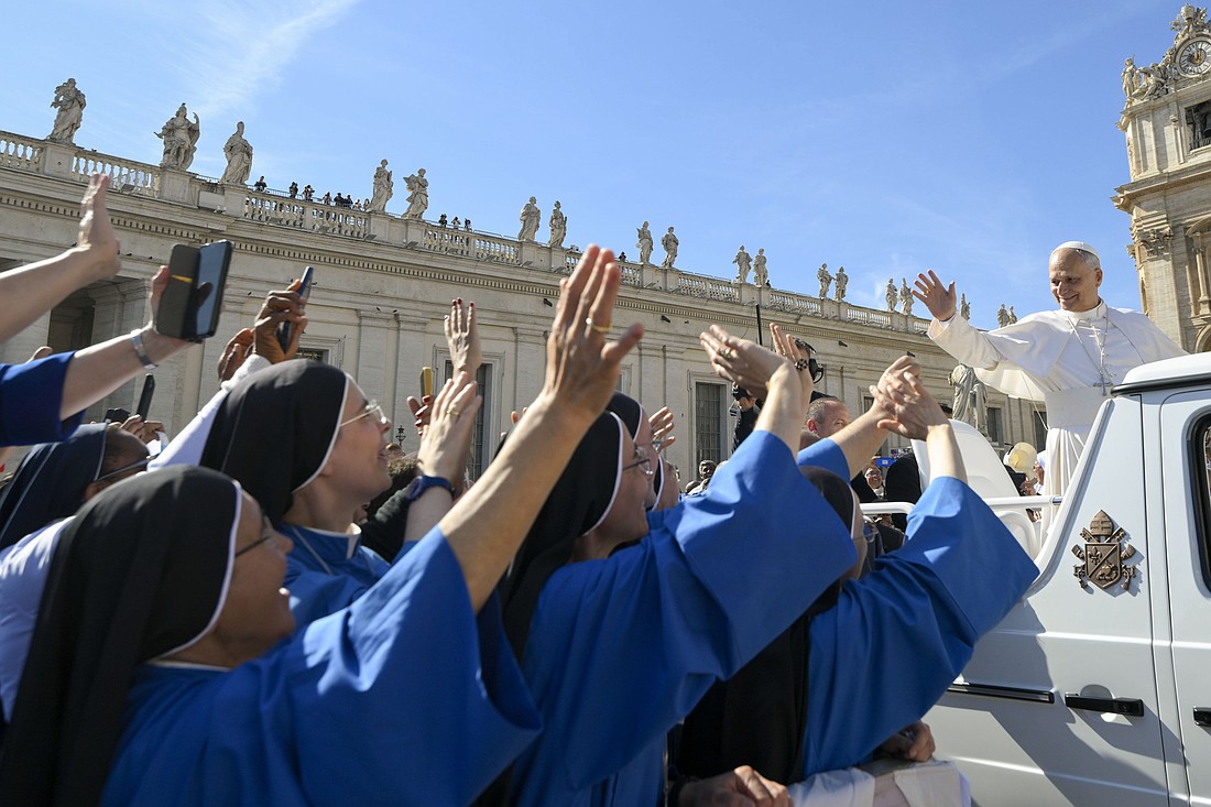 Pope Leo XIV greets visitors after celebrating Mass in St. Peter's Square at the Vatican Oct. 9, 2025, as part of the the Jubilee of Consecrated Life. Thousands of men and women religious, monks, contemplatives, members of secular institutes, consecrated virgins, hermits and people belonging to "new institutes" came to Rome from all over the world for their Oct. 8-9 Jubilee. (CNS photo/Vatican Media)