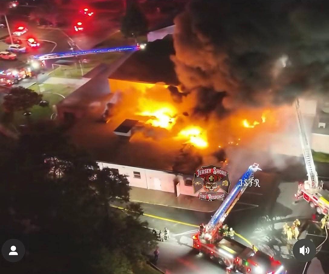 Firefighters battle the Oct. 3 blaze. Courtesy photo