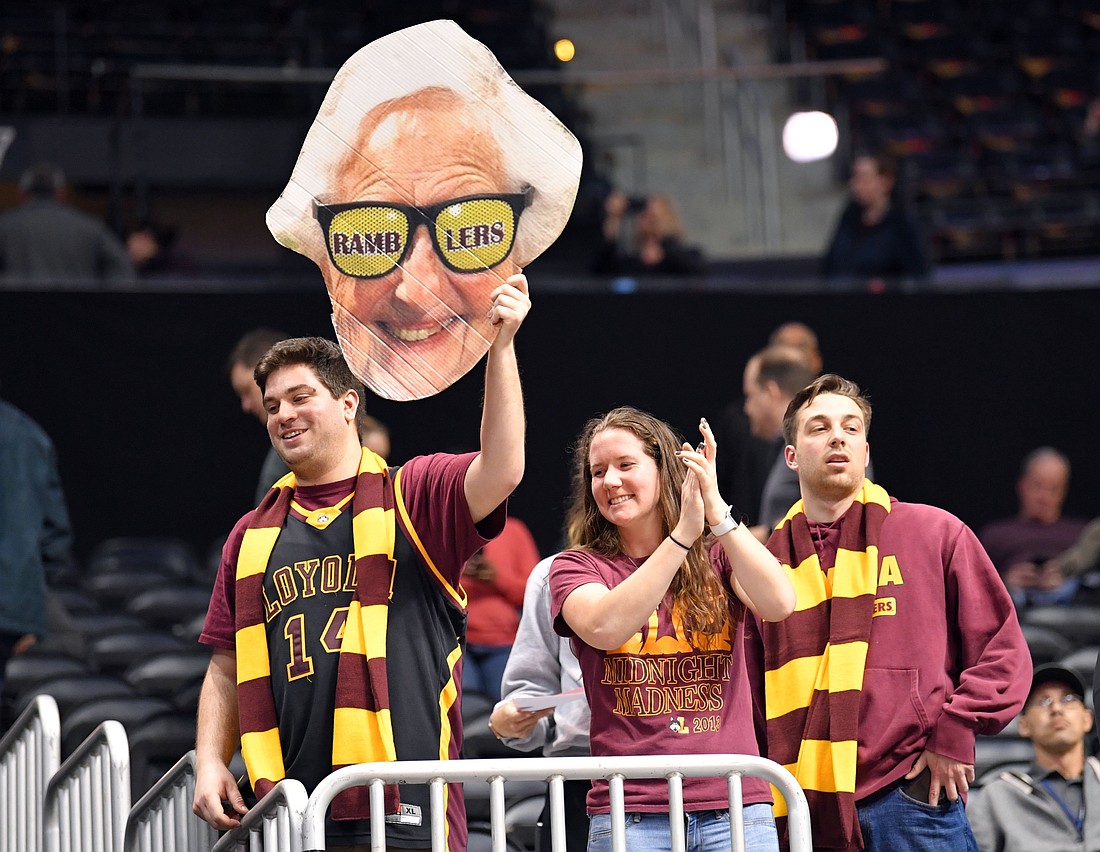 Loyola Ramblers fans hold up a poster of Sister Jean Dolores Schmidt, longtime chaplain of the men's basketball team, after the team defeated the Kansas State Wildcats in the championship game of the South regional of the 2018 NCAA Tournament in Atlanta. Sister Jean died at age 106 Oct. 9, 2025. (OSV News photo/Dale Zanine-USA TODAY Sports via Reuters)