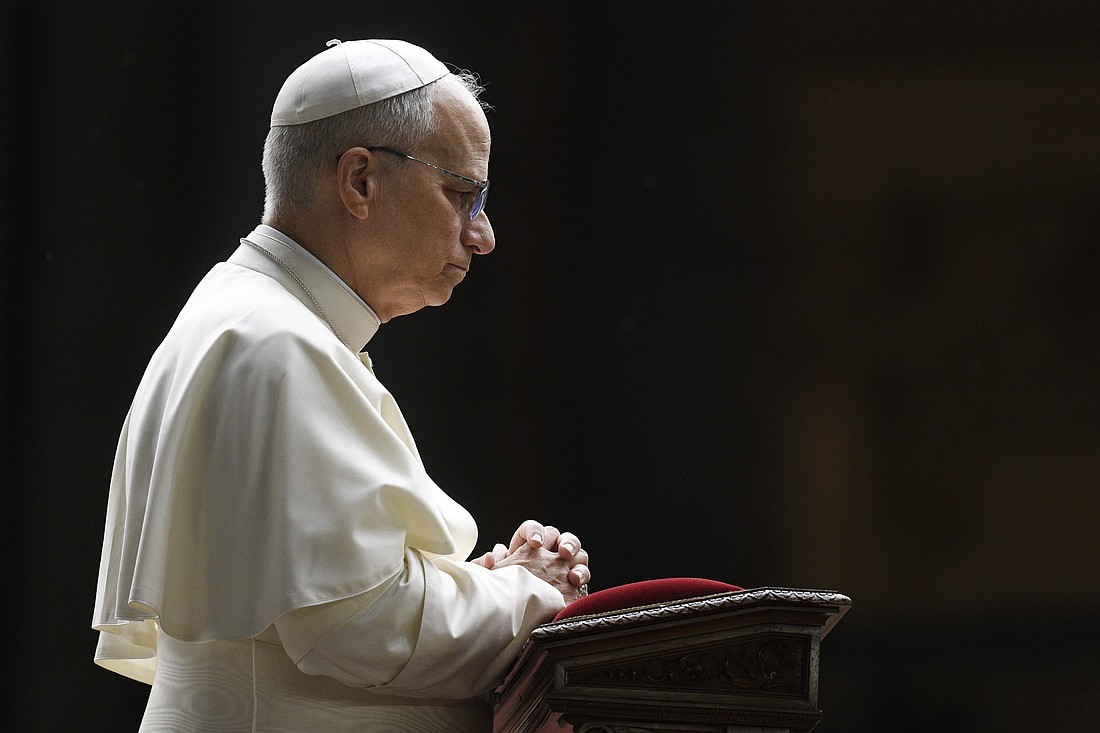Pope Leo XIV kneels in prayer in St. Peter's Square at the Vatican Oct. 11, 2025, during a prayer vigil and the recitation of the rosary for peace as part of the Jubilee of Marian Spirituality. (CNS photo/Vatican Media)