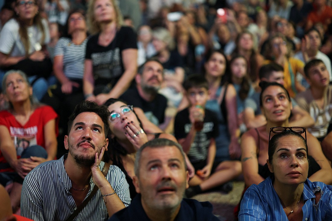 People gather in "Hostages Square," after a ceasefire between Israel and Hamas in the Gaza Strip went into effect, in Tel Aviv, Israel, Oct. 11, 2025. (OSV News photo/Hannah McKay, Reuters)..