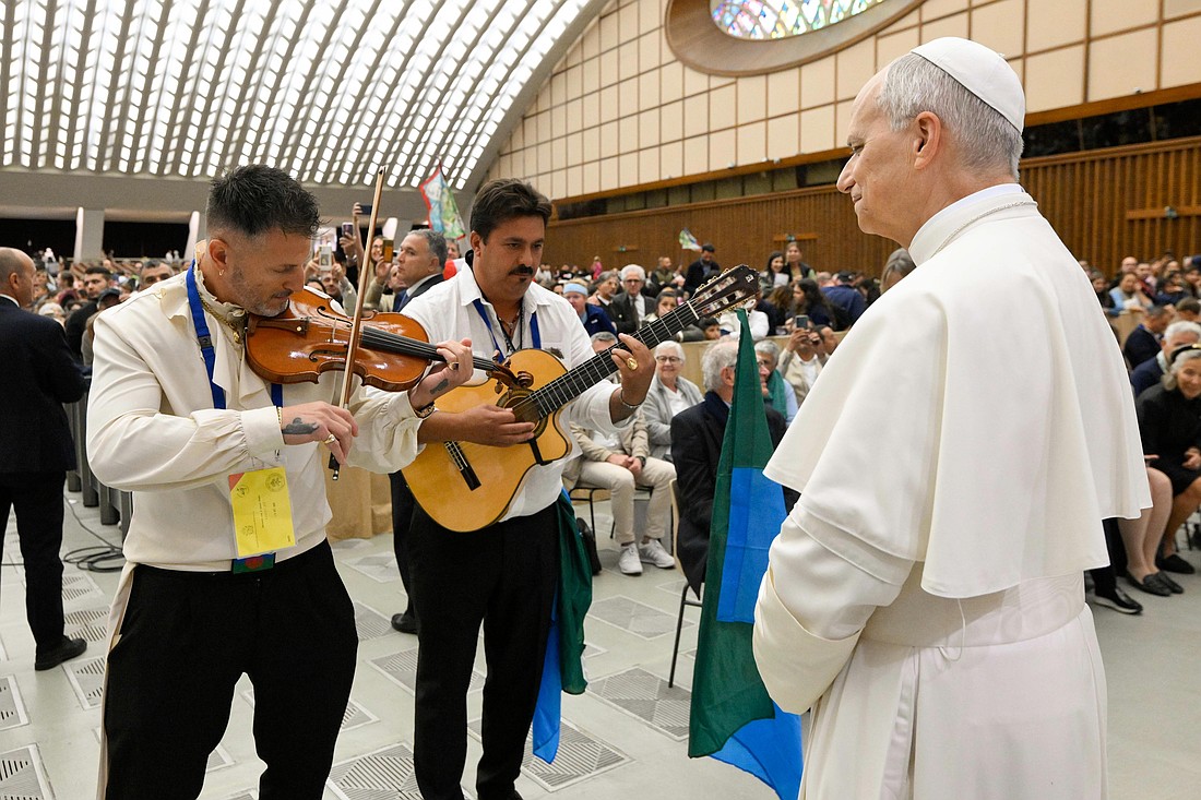 Musicians perform for Pope Leo XIV during the Jubilee of the Roma, Sinti and Traveling Peoples in the Paul VI Audience Hall at the Vatican Oct. 18, 2025. (CNS photo/Vatican Media)