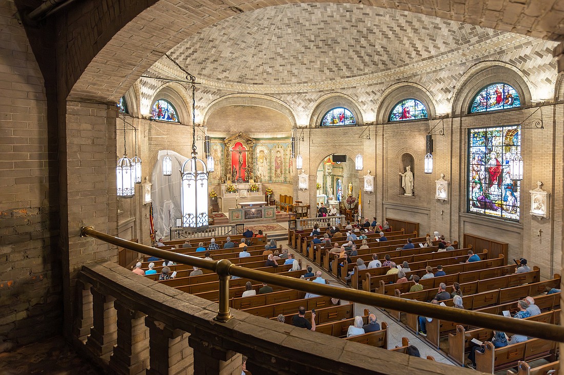 Parishioners and members of the public gather in St. Lawrence Basilica in Asheville, N.C., Oct. 17, 2025, for a "Restoration Celebration" to kickstart a massive restoration project for the 116-year-old basilica. The celebration featured speeches, prayer, tours and performance of a choral work composed by renowned Spanish architect Rafael Guastavino Sr., who designed and supervised the basilica's construction and is buried inside it. (OSV News photo/Gabe Swinney, Catholic News Herald)