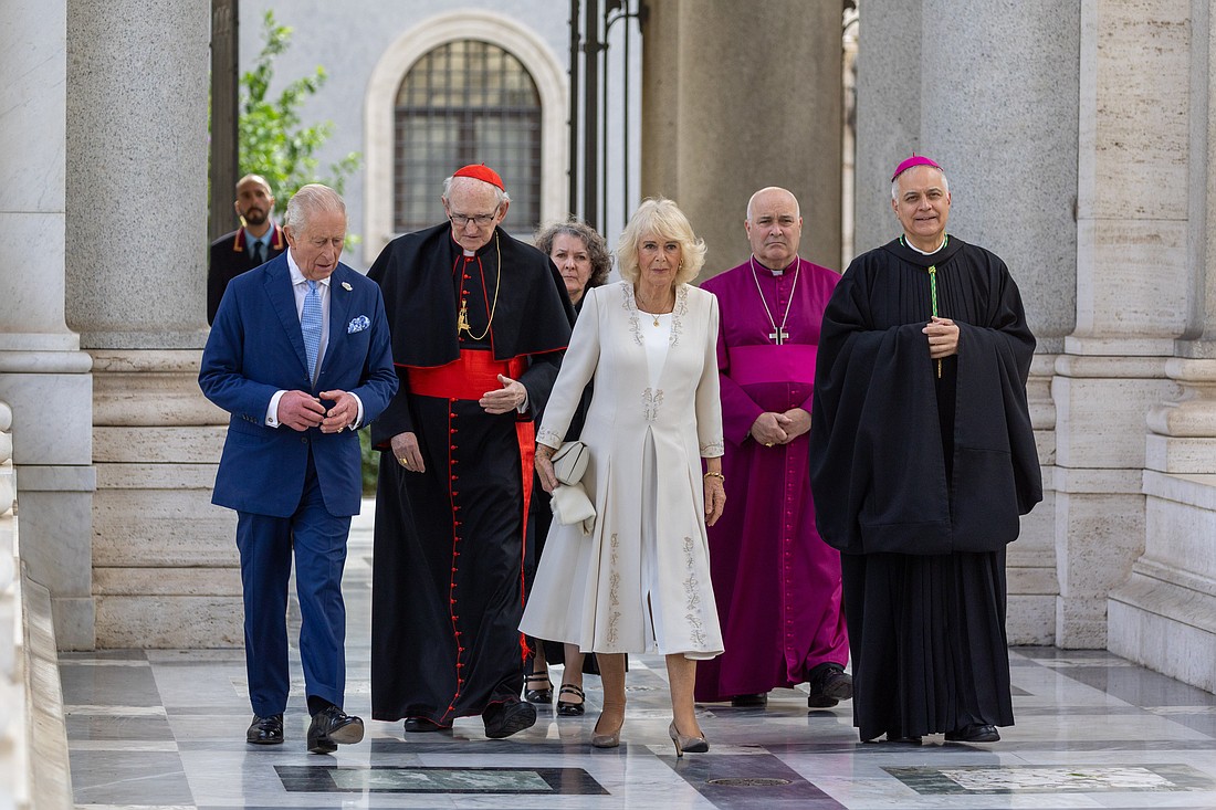 Britain's King Charles III arrives at Rome's Basilica of St. Paul Outside the Walls for an ecumenical prayer service Oct. 23, 2025. Seen with him are, from left: U.S. Cardinal James M. Harvey, archpriest of the basilica; the Rev. Rosie Frew, moderator of the Presbyterian Church of Scotland; Queen Camilla; Anglican Archbishop Stephen Cottrell of York; and Benedictine Abbot Donato Ogliari, head of the monastery of St. Paul Outside the Walls. (CNS photo/Daniel Ibáñez, pool)