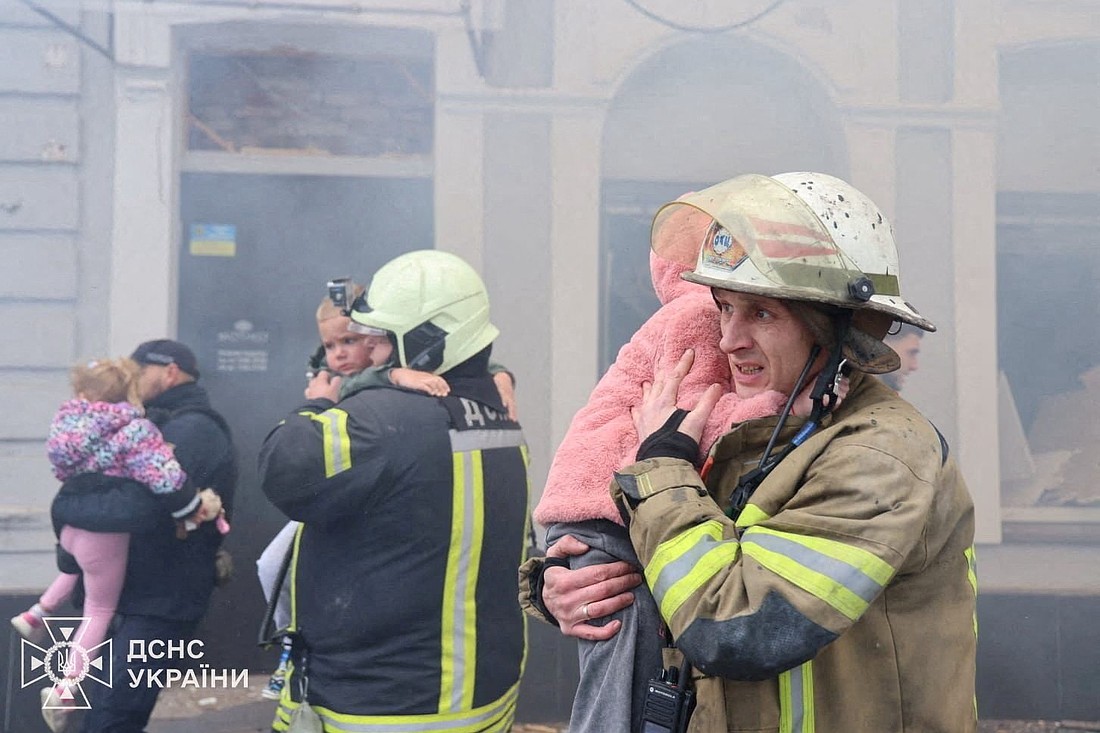 Rescuers evacuate children from a kindergarten hit by a Russian drone strike in Kharkiv, Ukraine, Oct. 22, 2025. Metropolitan Archbishop Borys A. Gudziak of the Ukrainian Catholic Archeparchy of Philadelphia spoke out after Russian forces struck the kindergarten in Ukraine's second largest city. (OSV News photo/Press service of the State Emergency Service of Ukraine via Reuters)..Editors: Ukraine/Handout via REUTERS ATTENTION EDITORS - THIS IMAGE HAS BEEN SUPPLIED BY A THIRD PARTY. MUST NOT OBSCURE LOGO.