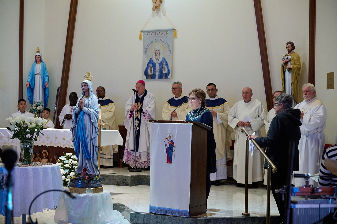 Bishop O'Connell and priests concelebrate the Mass for Regional Altar-Rosary Society members from parishes in Burlington, Mercer and Ocean Counties Oct. 25 in St. Ann Church, Browns Mills. Mike Ehrmann photos