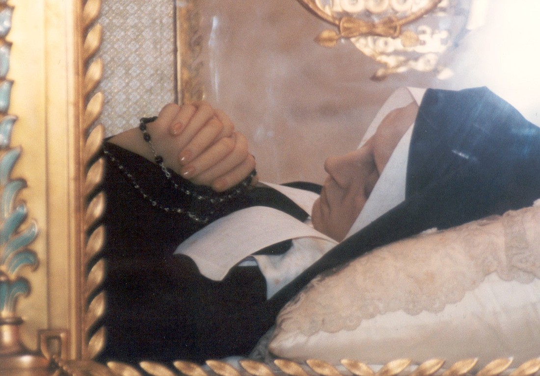 The body of visionary St. Bernadette (Soubirous) of Lourdes is seen through a glass encasement at the convent where she died in 1879 in Nevers, France. The Virgin Mary appeared to the 14-year-old French peasant Marie Bernarde Soubirous at Lourdes beginning in 1858. St. Bernadette entered the convent at Nevers at age 22 and remained there until her death at age 35. Her feast is April 16. (OSV News photo/Joann S. Keane)