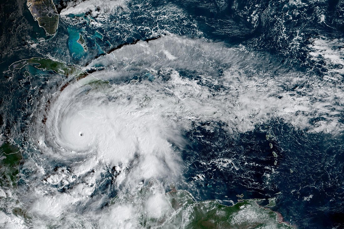 Hurricane Melissa, which has developed into a Category 5 storm, moves north in the Caribbean Sea towards Jamaica and Cuba in a composite satellite image obtained by Reuters on Oct. 27, 2025. Hurricane Melissa drew closer to Jamaica, where forecasters said it would unleash catastrophic flooding, landslides and widespread damage. It would be the strongest hurricane to hit the island since record-keeping began in 1851. (OSV News photoCIRA/NOAA/Handout via Reuters) THIS IMAGE HAS BEEN SUPPLIED BY A THIRD PARTY. OVERLAY ADDED BY THE SOURCE.