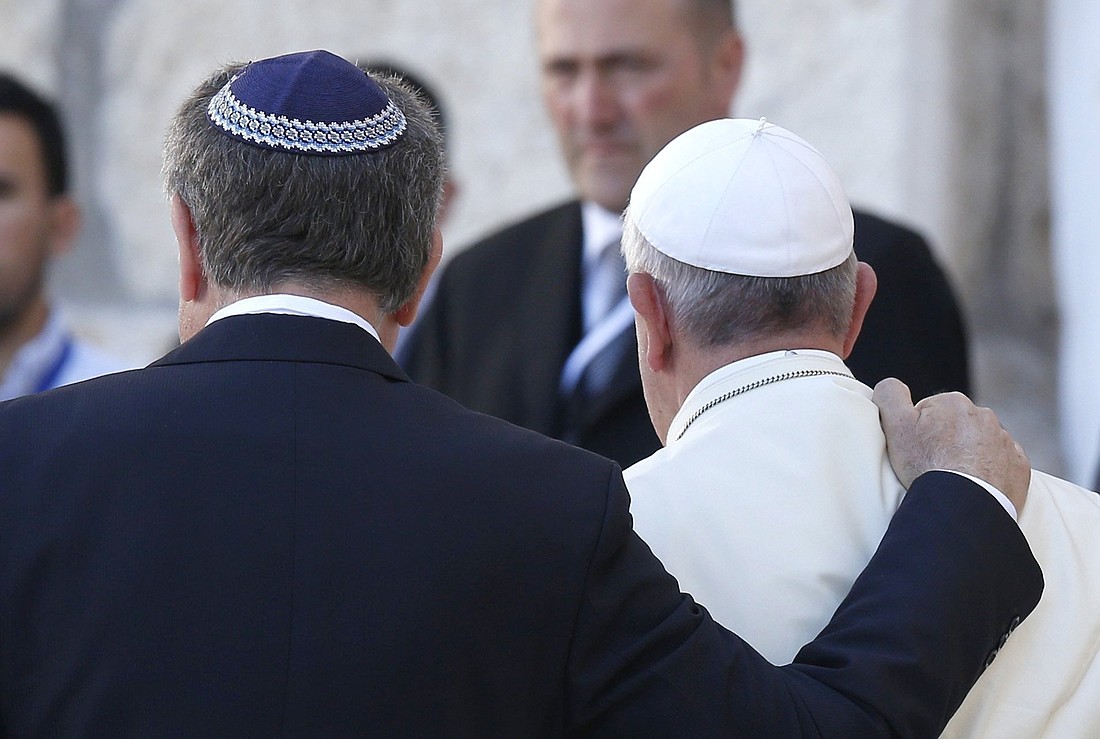 Rabbi Abraham Skorka of Buenos Aires, Argentina, and Pope Francis embrace after visiting the Western Wall in Jerusalem May 26, 2014. Pope Francis, formerly Argentine Cardinal Jorge Mario Bergoglio, died April 21, 2025, at age 88. (CNS photo/Paul Haring)