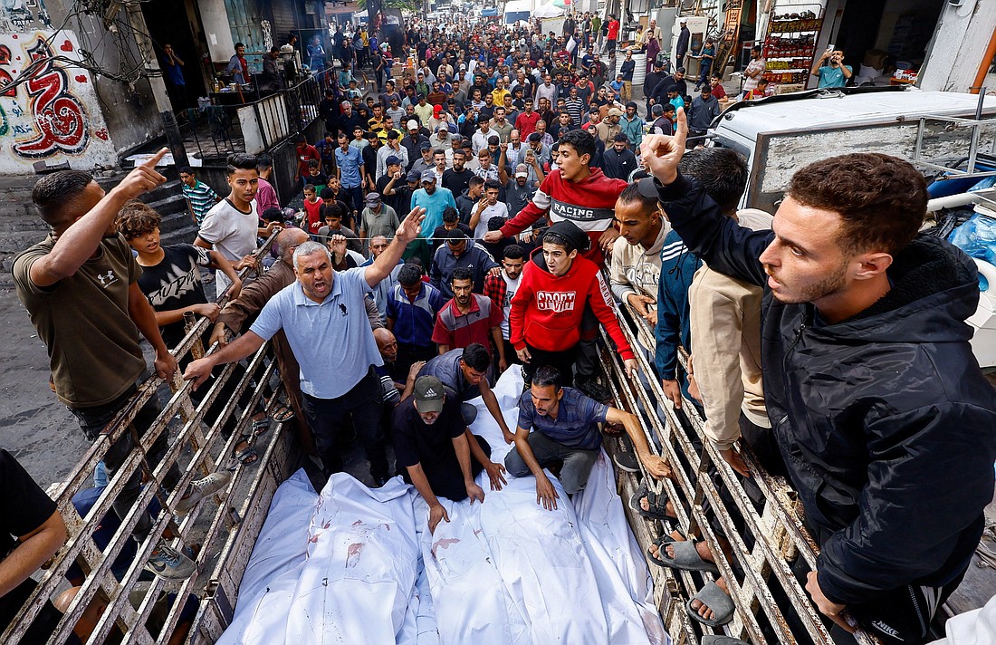 Mourners gather for the funeral of members of the Abu Dalal family in Nuseirat, in central Gaza Strip, Oct. 29, 2025, who were killed in an overnight Israeli strike on their home, according to medics. (OSV News photo/Mahmoud Issa, Reuters)