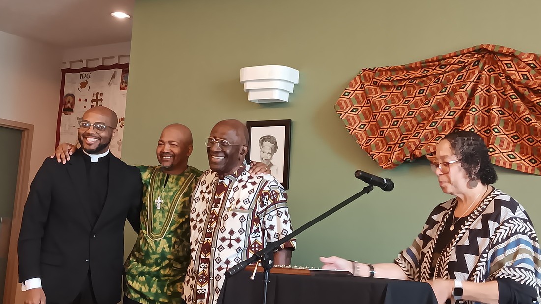 Father Kareem Smith, left, and Deacon Mel Tardy, center, pose at St. Augustine Church in South Bend, Ind., on All Saints' Day, Nov. 1, 2025, with Holy Cross Brother Roy Smith after he received an award from the Black Catholic Advisory Board of the Diocese of Fort Wayne-South Bend for his long community service as an educator, social worker and development director. BCAB member Wendy Summers, right, presented the award. Father Smith, a New York archdiocesan priest, is president of the National Black Catholic Clergy Caucus, and Deacon Tardy serves at St. Augustine. (OSV News photo/Catherine Odell) Best quality available.