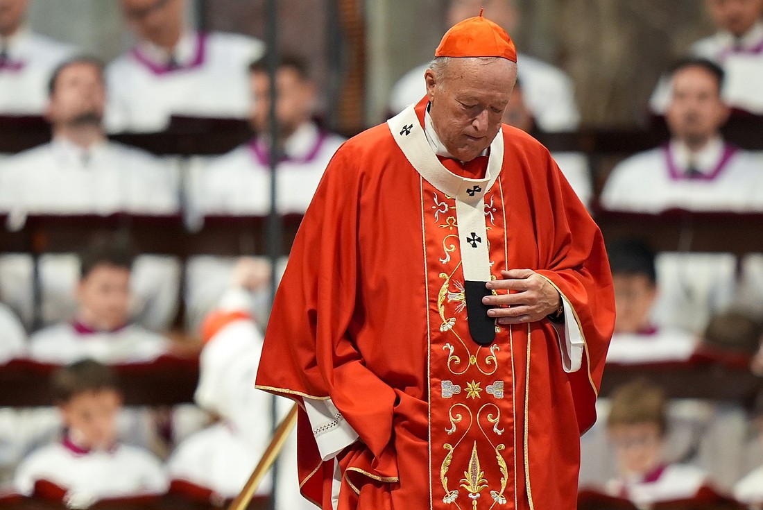 Washington Cardinal Robert W. McElroy walks back to his seat after receiving the pallium from Pope Leo XIV during Mass in St. Peter's Basilica at the Vatican June 29, 2025, the feast of Sts. Peter and Paul. The Archdiocese of Washington announced Nov. 5 that Cardinal McElroy has been diagnosed with cancer, to be surgically removed Nov. 13. The archdiocese said the cardinal has "well-differentiated liposarcoma," a non-aggressive cancer "that tends not to metastasize." (CNS photo/Lola Gomez)