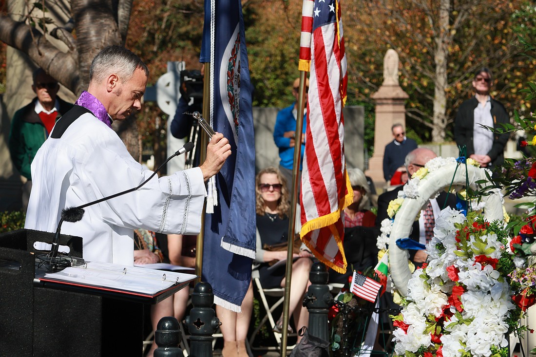 Father Anthony Marques, rector of the Cathedral of the Sacred Heart, Richmond, Va., sprinkles holy water on the grave of Eliza Monroe Hay at Hollywood Cemetery in Richmond Oct. 23, 2025. Hay, daughter of U.S. President James Monroe, the nation's fifth president, was reinterred alongside her father and mother. Hay became a Catholic in the 1830s and died in Paris in 1840. Upon her death, her physical remains were buried in an unmarked grave in Père Lachaise Cemetery 185 years ago. (OSV News photo/D. Hunter Reardon, The Catholic Virginian).