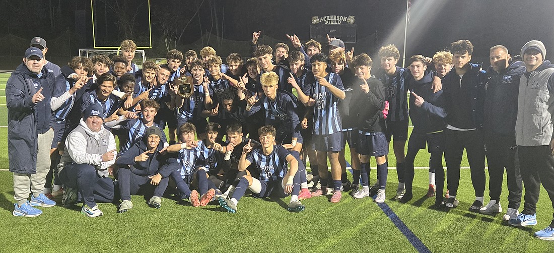 The Notre Dame High boys soccer team is all smiles after taking a 2-1 win over Princeton in the Colonial Valley Conference Tournament championship game. It was ND's first tournament title since winning the Mercer County Tournament in 2013. Rich Fisher photo