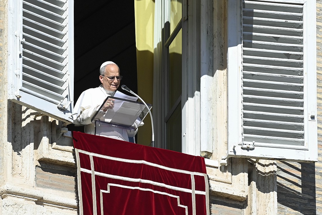Pope Leo XIV leads the recitation of the Angelus prayer from the window of studio overlooking St. Peter's Square at the Vatican Nov. 9, 2025. (CNS photo/Vatican Media)