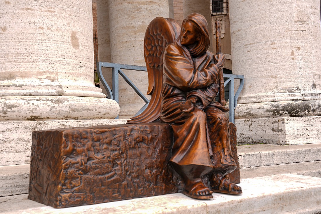 Be Welcoming, a bronze sculpture of a traveler by Canadian artist Timothy Schmalz, is seen in St. Peter's Square at the Vatican April 15, 2025. (CNS photo/Justin McLellan)