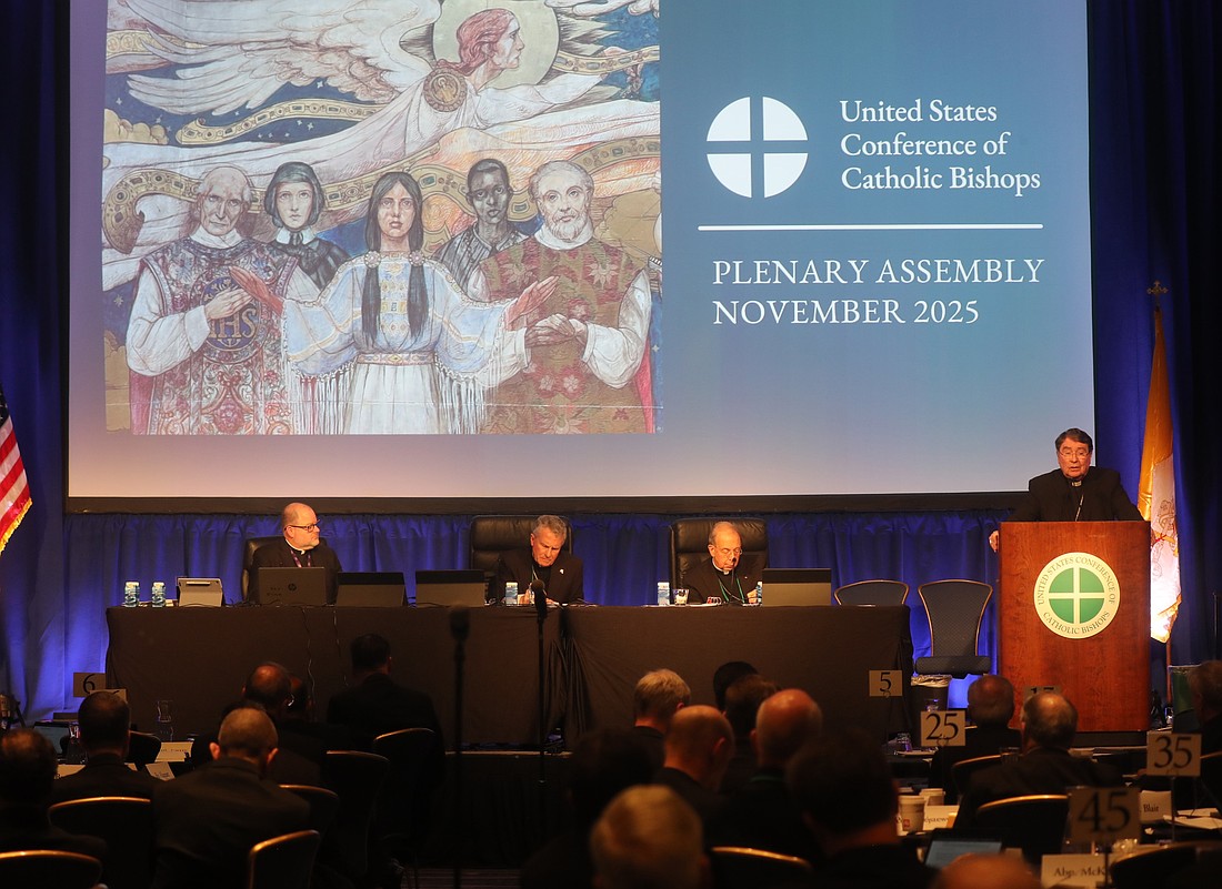 Cardinal Christophe Pierre, papal nuncio to the United States, delivers his address during a Nov. 11, 2025, session of the fall general assembly of the U.S. Conference of Catholic Bishops in Baltimore. Also pictured are Father Michael Fuller, general secretary of the U.S. Conference of Catholic Bishops; Archbishop Timothy P. Broglio of the U.S. Archdiocese for the Military Services, outgoing president; and Archbishop William E. Lori of Baltimore, outgoing vice president. (OSV News photo/Bob Roller)