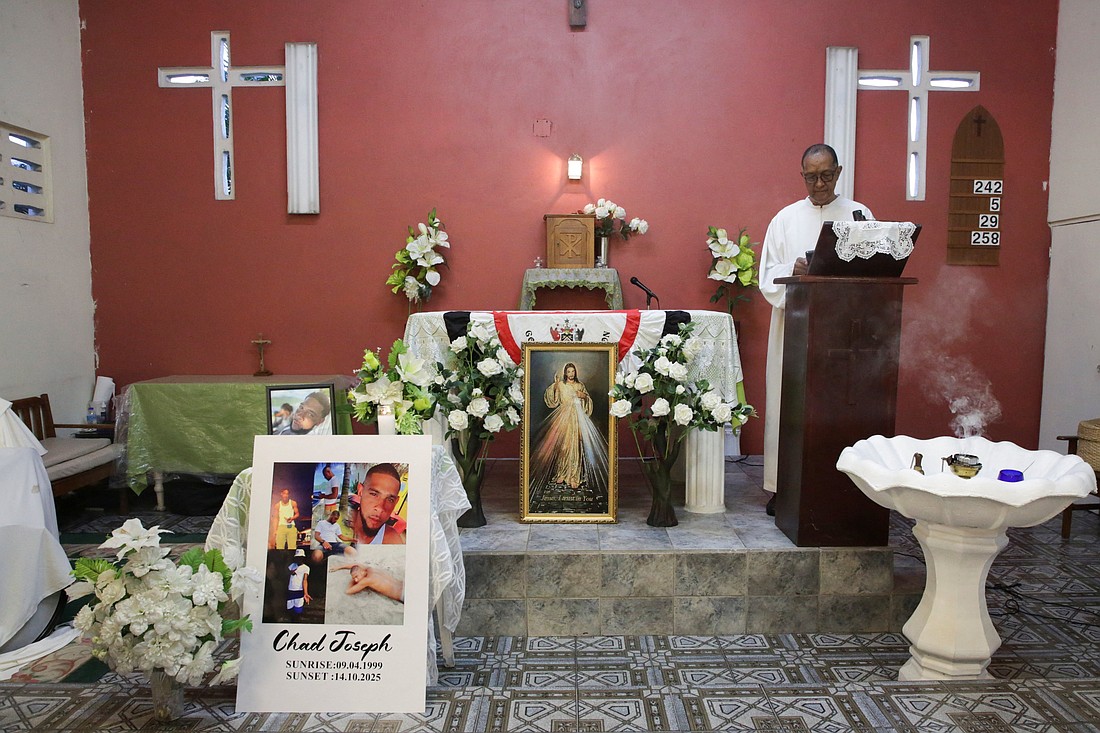 A priest conducts Mass during a memorial held by family members of Chad Joseph, who believe he was killed in a U.S. military strike on a boat in the Caribbean, at St. Michael's Catholic Church in Las Cuevas, Trinidad and Tobago, Oct. 22, 2025. (OSV News photo/Andrea de Silva, Reuters)