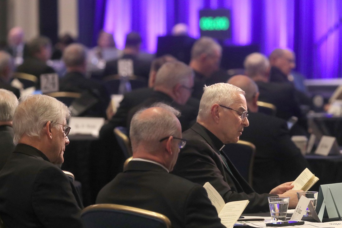 Bishops pray during a Nov. 12, 2025, session of the fall general assembly of the U.S. Conference of Catholic Bishops in Baltimore. (OSV News photo/Bob Roller)