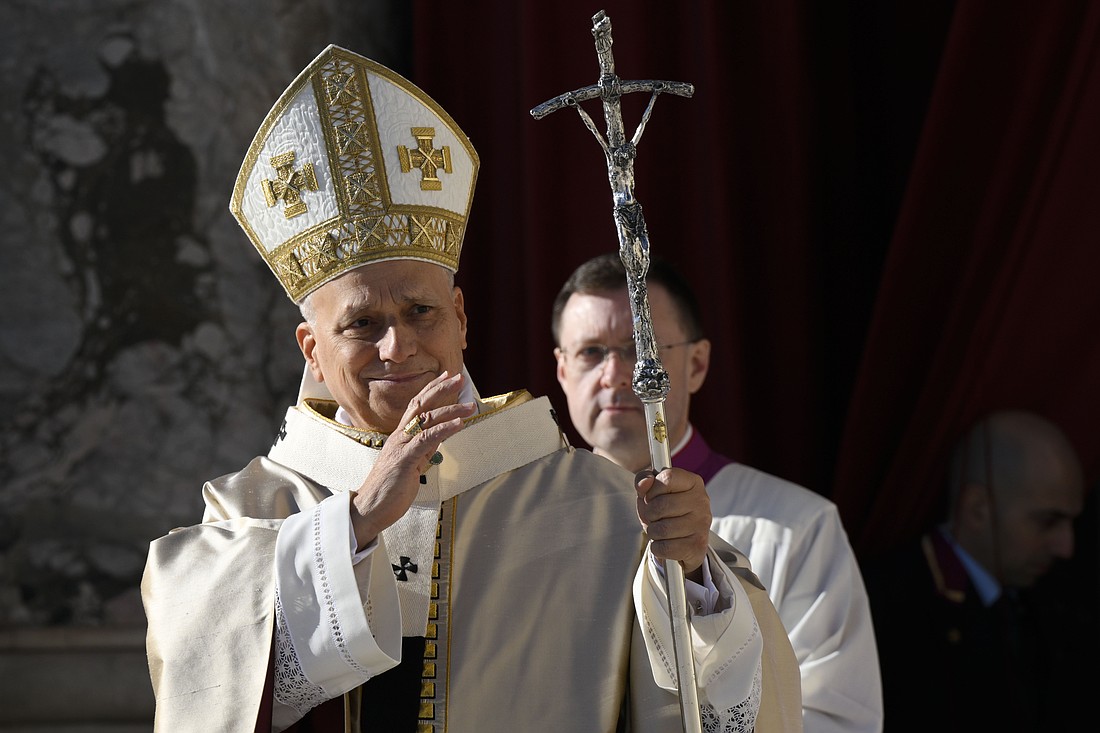 Pope Leo XIV gives his blessing to people attending Mass for the Jubilee of Choirs and the feast of Christ the King Nov. 23, 2025, in St. Peter's Square at the Vatican. At the end of Mass, the pope announced the release of his apostolic letter, "In Unitate Fidei" ("In the Unity of Faith") on the Creed and the 1,700th anniversary of the Council of Nicaea. (CNS photo/Vatican Media)