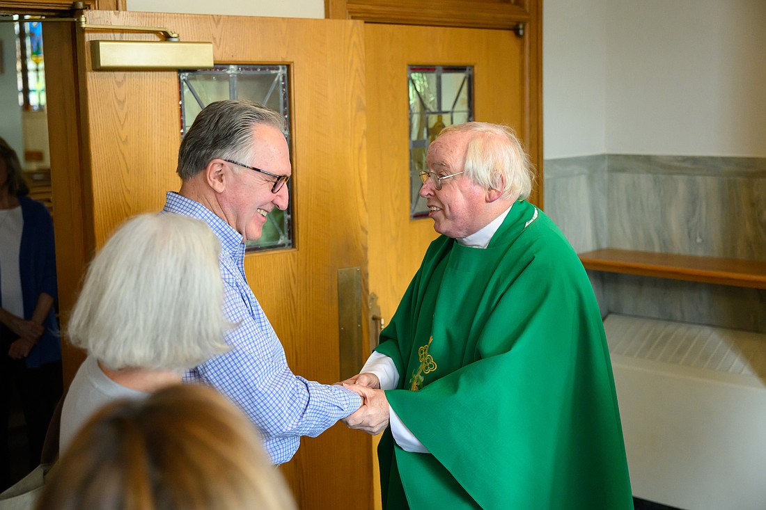 Parishioners of St. Mark, Sea Girt, congratulate Msgr. Flynn after his June 25, 2023 retirement Mass. Mike Ehrmann photos