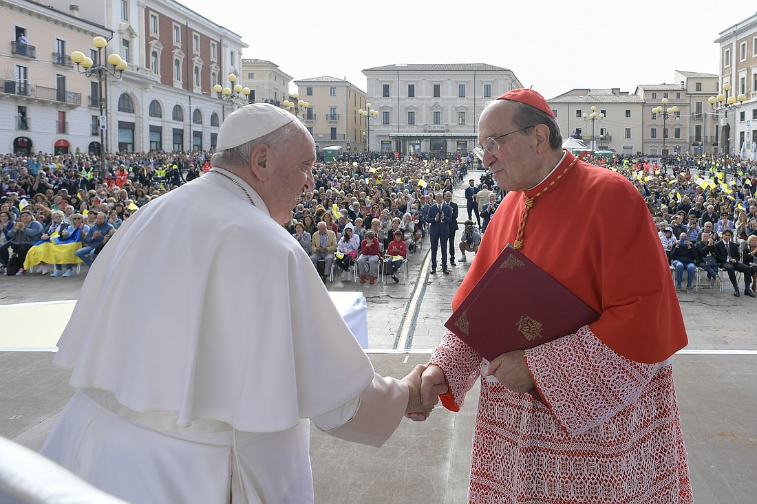Pope Francis greets Cardinal Giuseppe Petrocchi of L'Aquila during an encounter in Piazza Duomo in L'Aquila, Italy, Aug. 28, 2022. (CNS photo/Vatican Media)