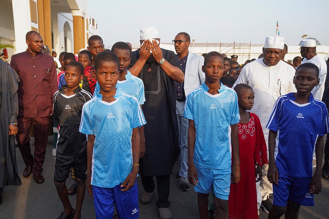 Schoolchildren from St. Mary's Catholic School in Papiri, Nigeria, arrive at the Niger State Government House Dec. 8, 2025, after being freed from captivity following their abduction by gunmen Nov. 21. (OSV News photo/Marvellous Durowaiye, Reuters)