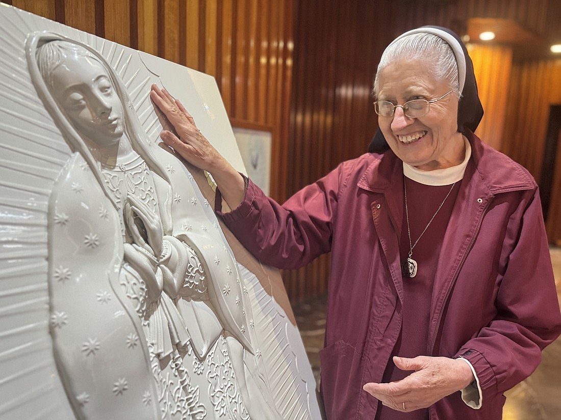 Sister María Celina Mota Campos moves toward a sculpture for the blind at the Basilica of Our Lady of Guadalupe in Mexico City Nov. 6, 2025. Sister María Celina, of the Order of the Incarnate Word and Blessed Sacrament, lost her sight to macular degeneration about 11 years ago, but said she's learned to see Our Lady of Guadalupe with her heart instead of her eyes. (OSV News photo/Rhina Guidos, GSR)