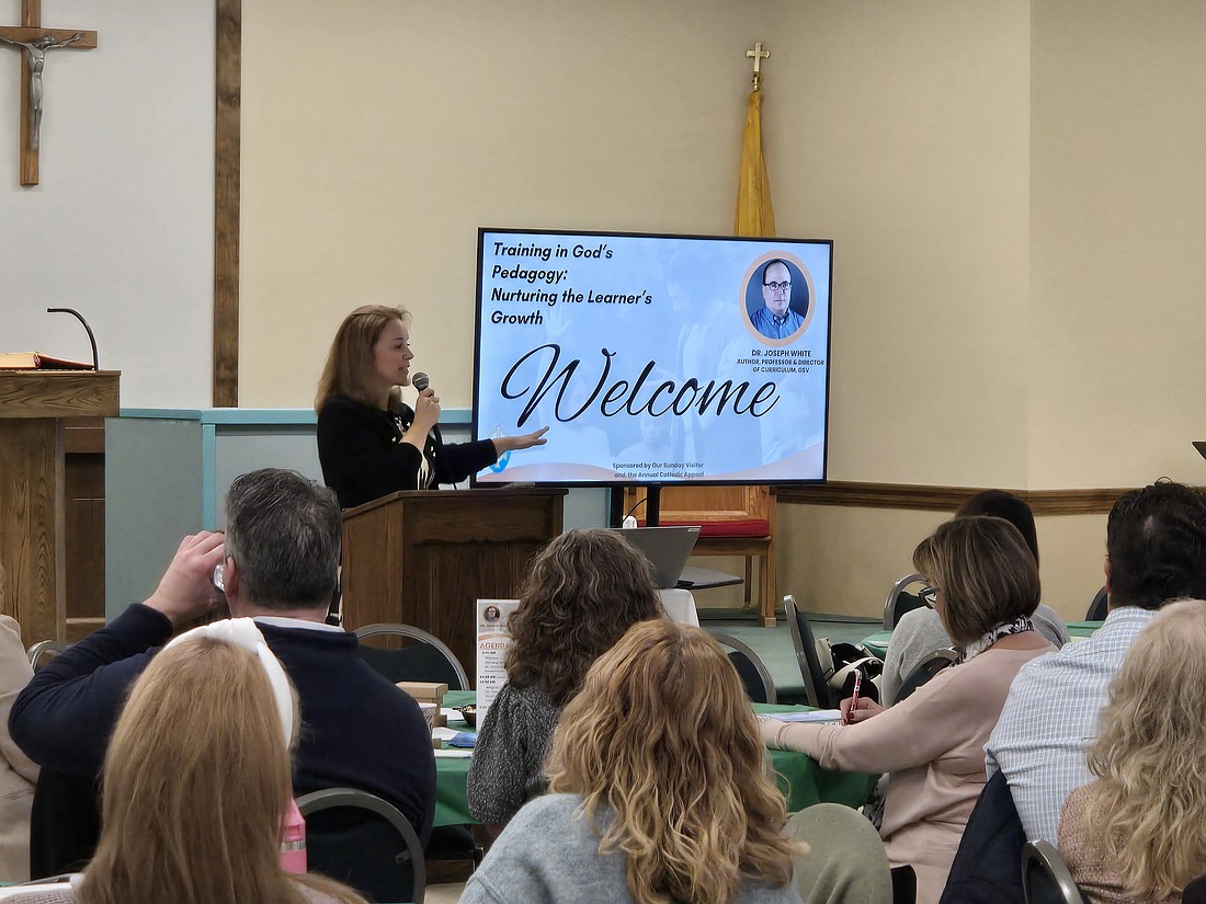 Bonnie Milecki, assistant superintendent, welcomes attendees to the Nov. 21 formation day in St. Catherine of Sienna Parish, Farmingdale. Courtesy photo