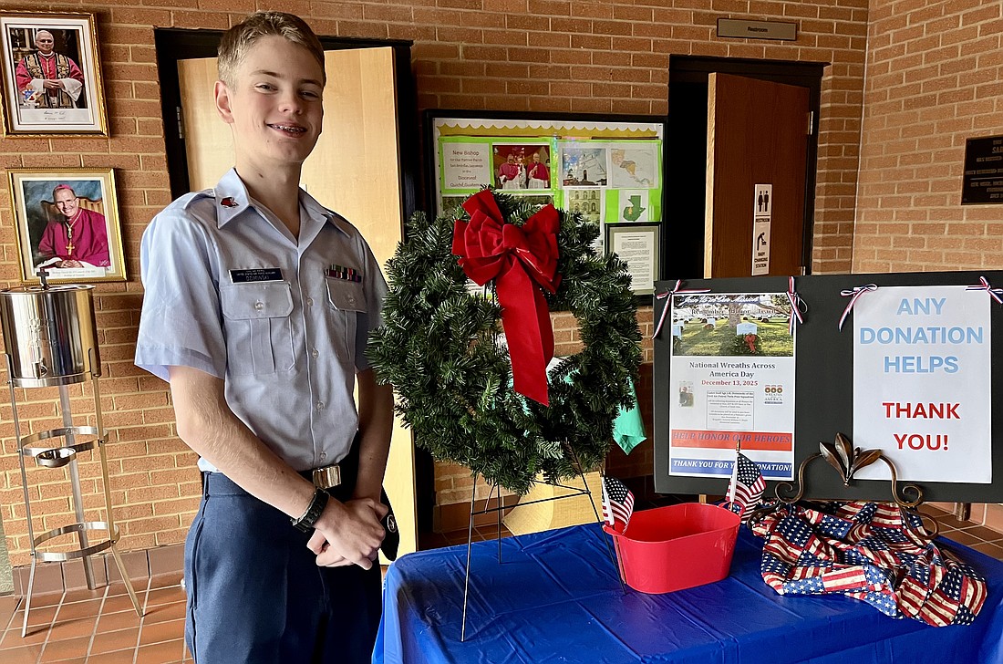 J.R. Dziminski, a student in Notre Dame High School and a member of St. Ann Parish, both Lawrenceville, participated in the Wreaths Across America campaign. This year he raised funds to purchase wreaths for the Brigadier General William C. Doyle Memorial Cemetery and to be placed on the graves of Civil War veterans buried in Morris Hall Cemetery. Courtesy photo