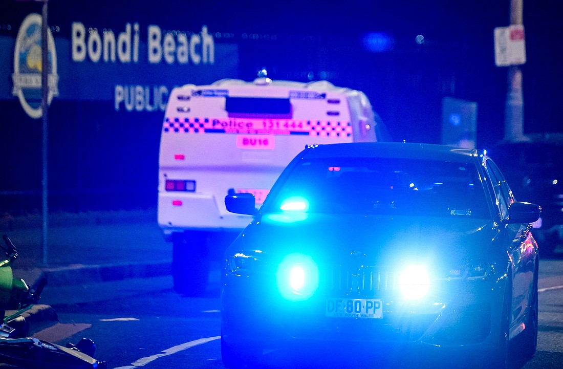 Emergency vehicles are at the scene of a mass shooting at Bondi Beach in Sydney Dec. 14, 2025. Two gunmen targeted Jewish beachgoers at an event celebrating the first day of Hanukkah, leaving 12 dead, including a gunman, and 29 wounded, New South Wales police said. (OSV News photo/Izhar Khan, Reuters)