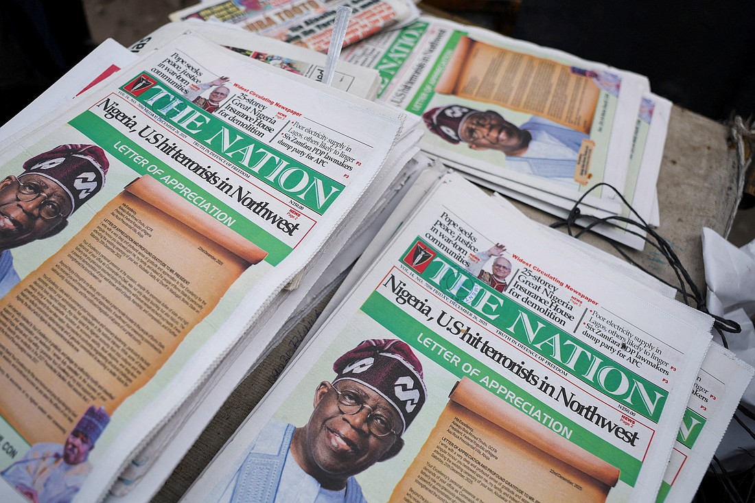Front pages of newspapers reporting on U.S. airstrikes against Islamic State group militants in Nigeria, according to U.S. President Donald Trump and the U.S. military, are displayed at a newspaper stall in Lagos, Nigeria, Dec. 26, 2025. (OSV News/Sodiq Adelakun, Reuters)