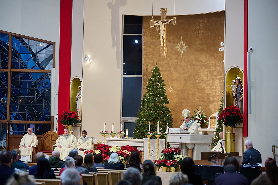 Bishop O'Connell preaches his homily in which he reflected on the Christmas story. Mike Ehrmann photos